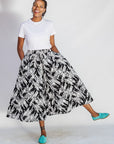 Model wearing black and white abstract culotte.