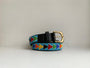 Blue beaded belt with rainbow arrows