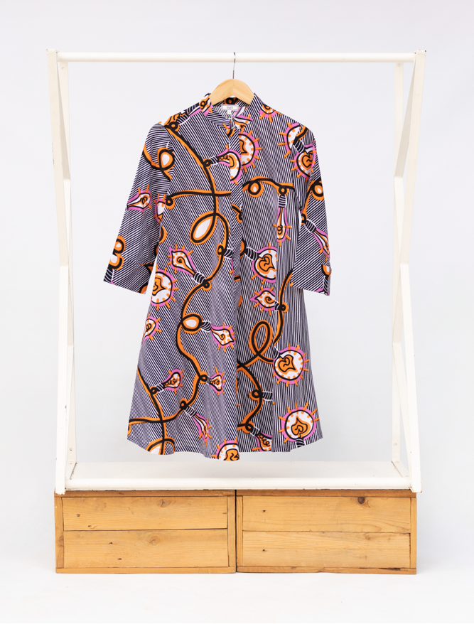 Display of black and white light bulb print dress.