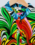 Display of a rainbow swirl design dress