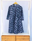 Display of black and white square batik dress