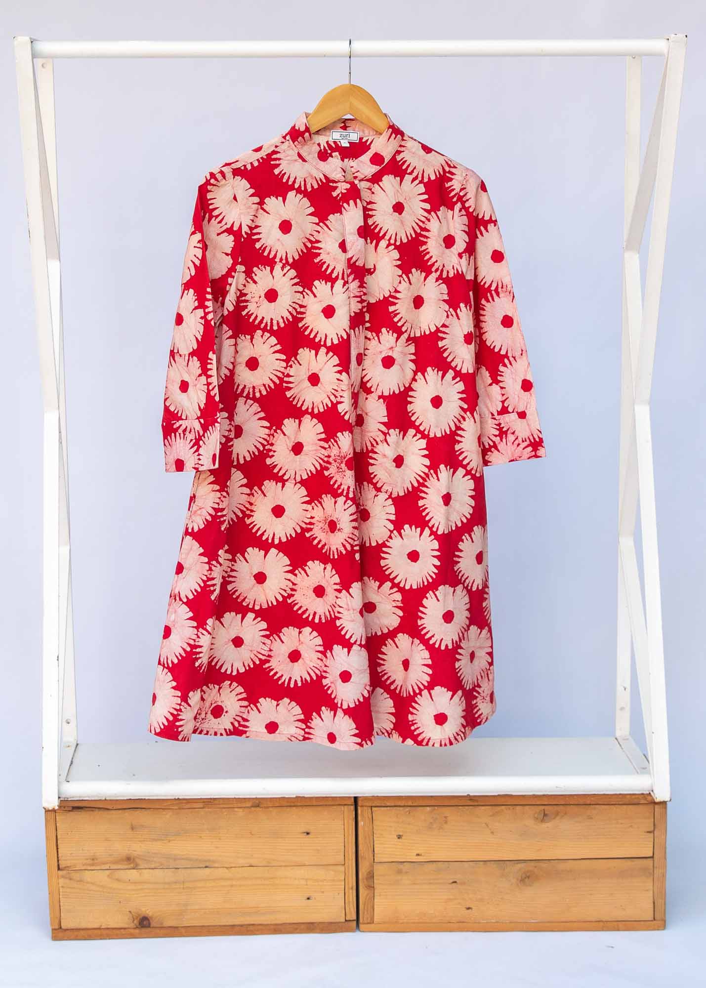 Display of pink and white floral print dress