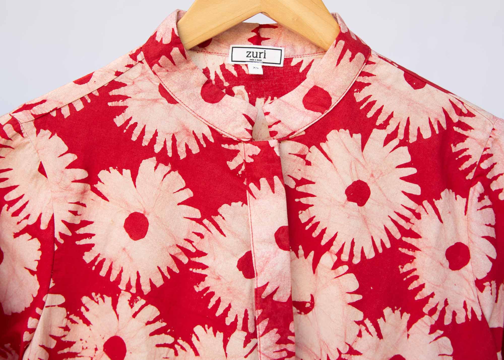 Display of pink and white floral print dress