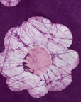 floral graphic on a purple background