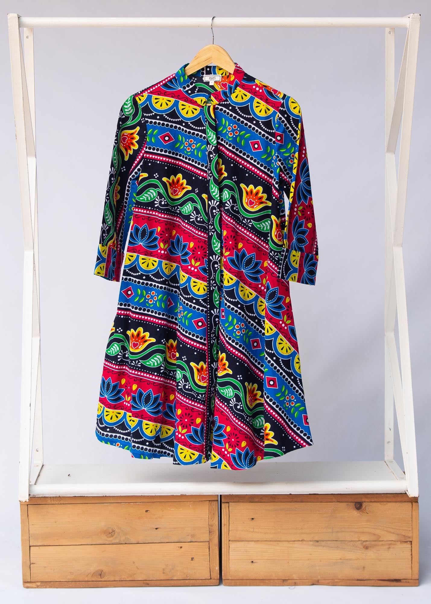 Display of colorful mandala print dress