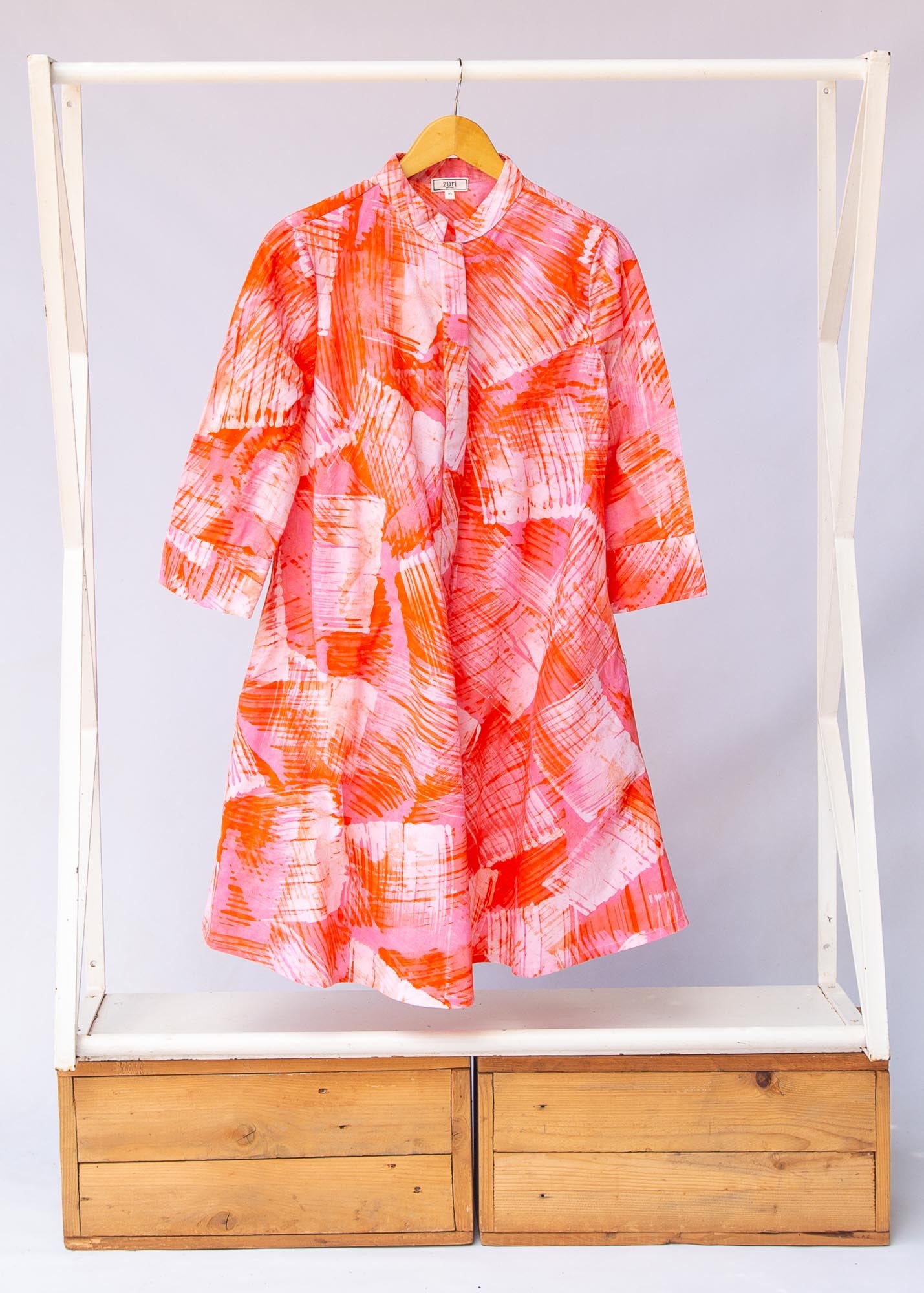 Display of orange, pink and white brushstrokes batik dress 