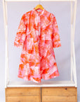 Display of orange, pink and white brushstrokes batik dress 
