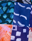 Display of handprinted batik patchwork top