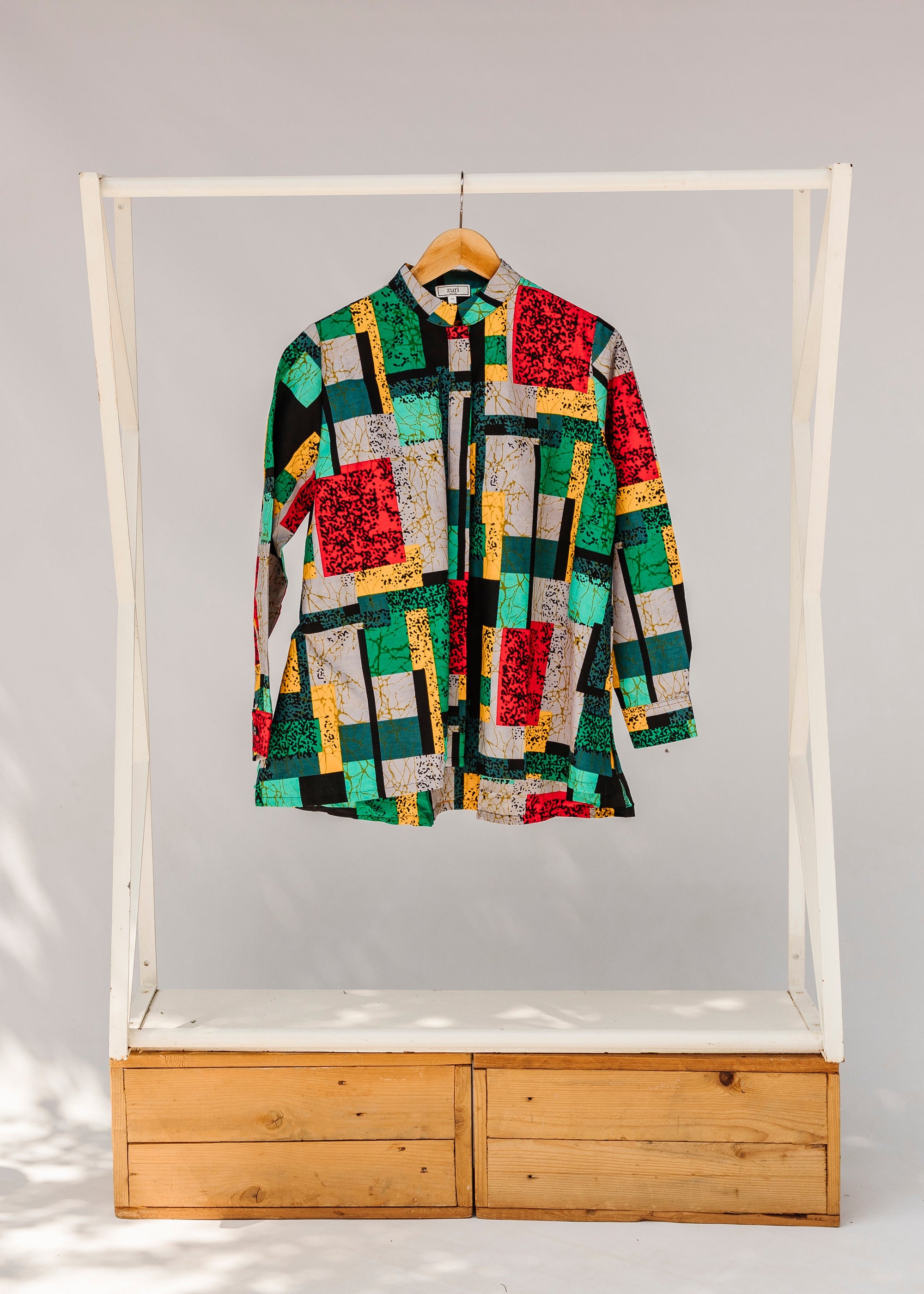 Display of mutlicolor abstract print shirt.