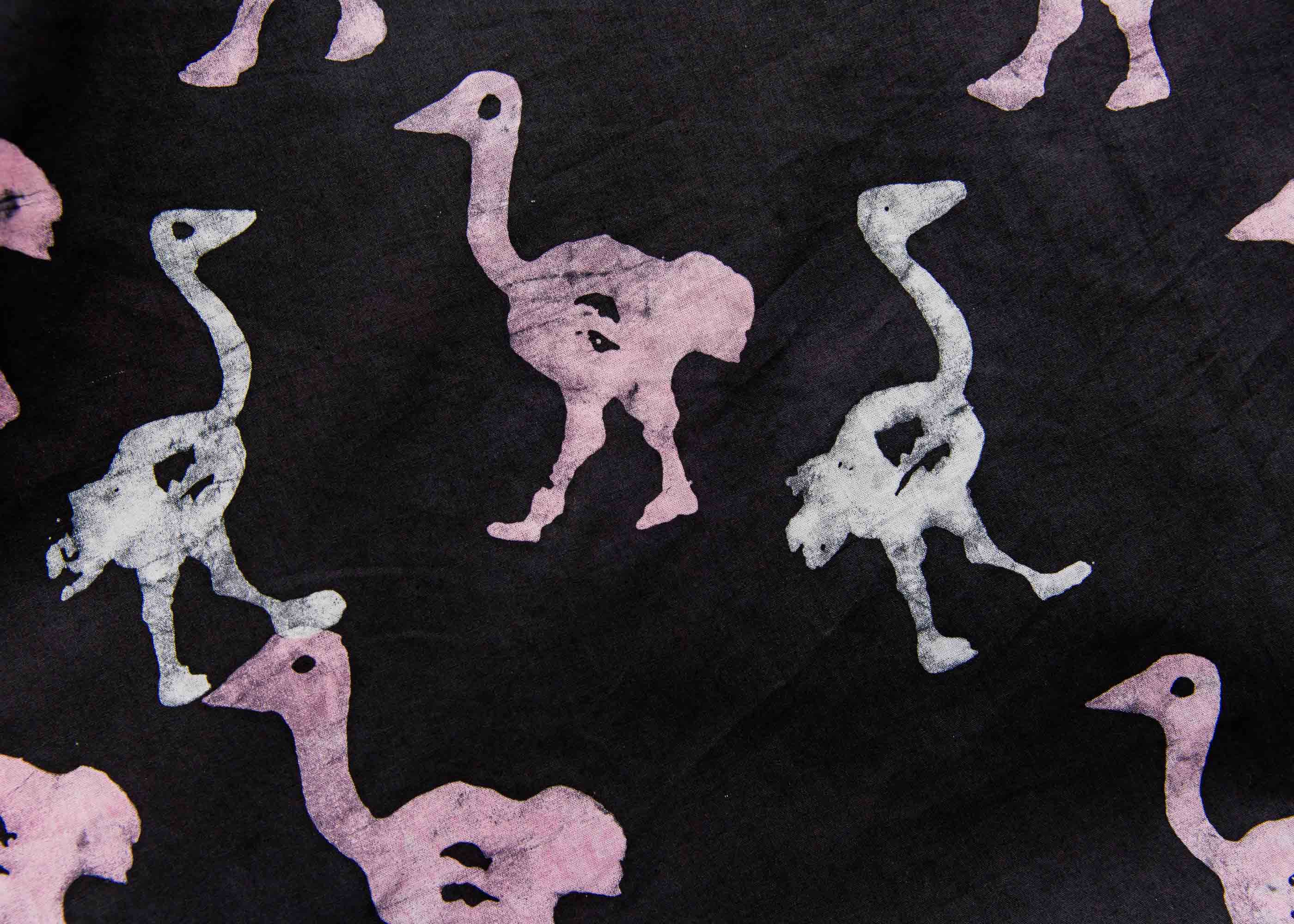 display of a black, white and pink ostrich design dress