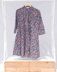 display of blue and red ribbon print dress.