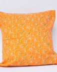 Display of 20x20 orange floral pillow case