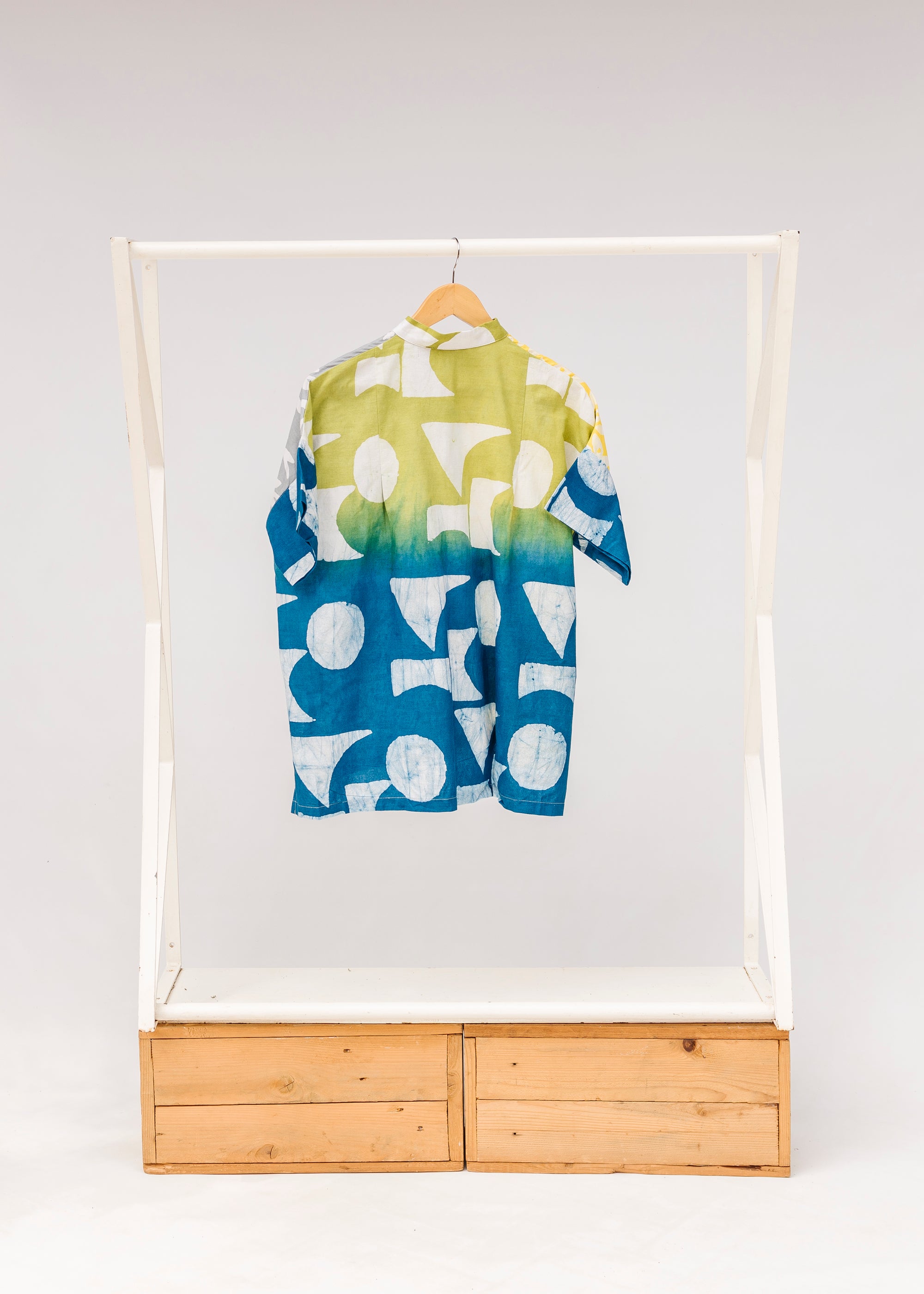 Display of mutlicolored batik shortsleeved shirt.