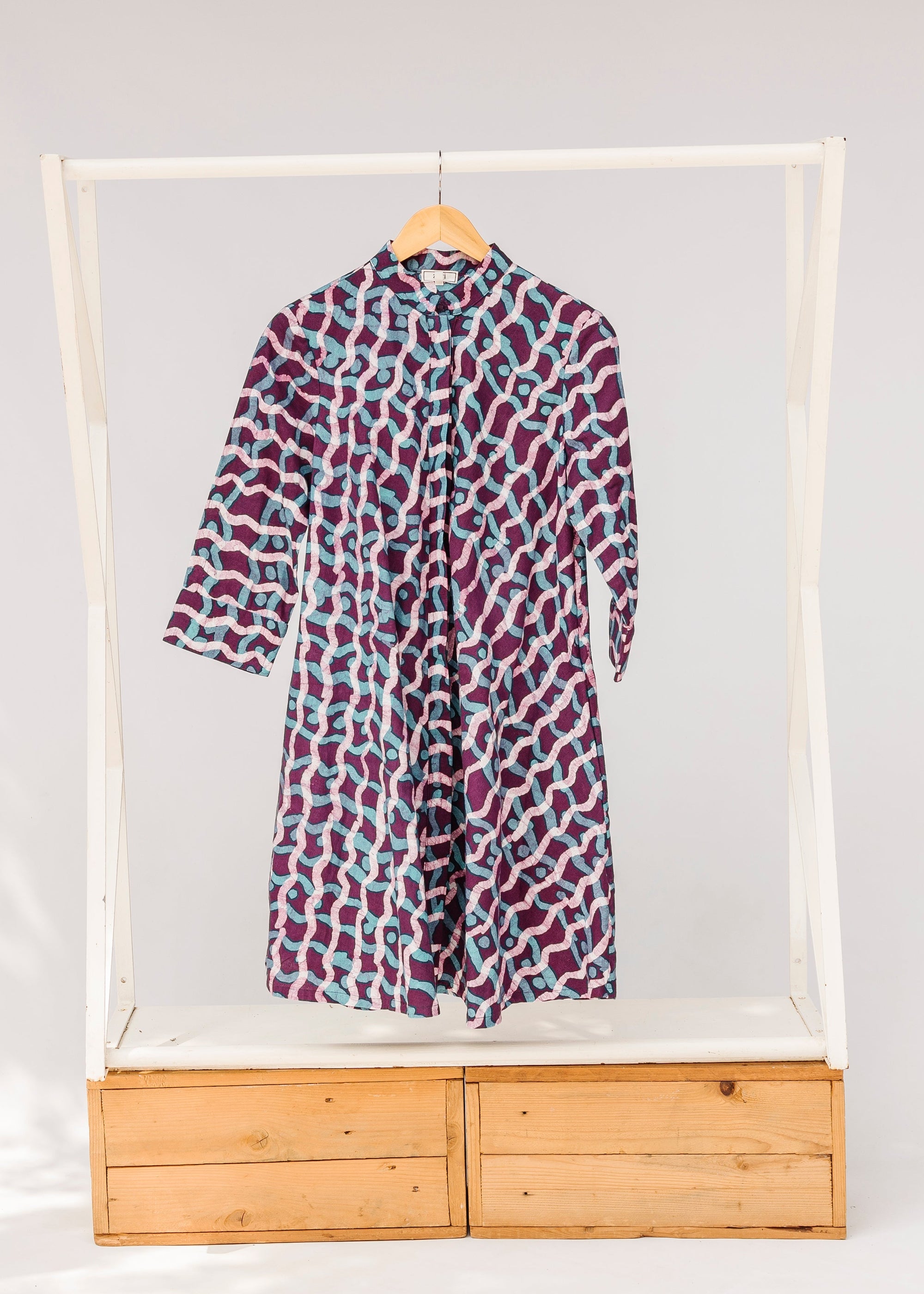 Display of purple and blue batik dress.