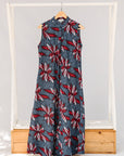 Display of grey, red and black dragonfly print dress.