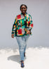Model wearing mutlicolor abstract print shirt.