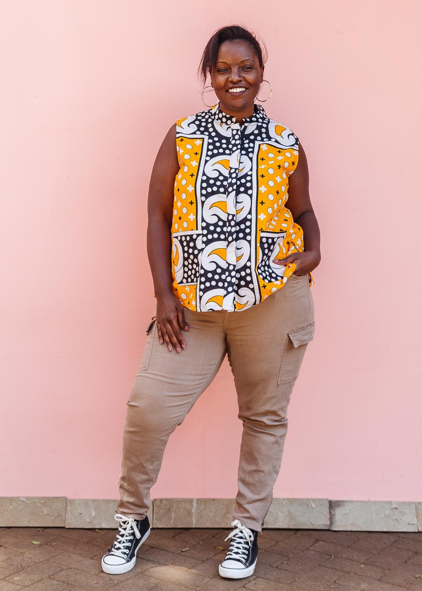 The model is wearing two toned pattern block print tank