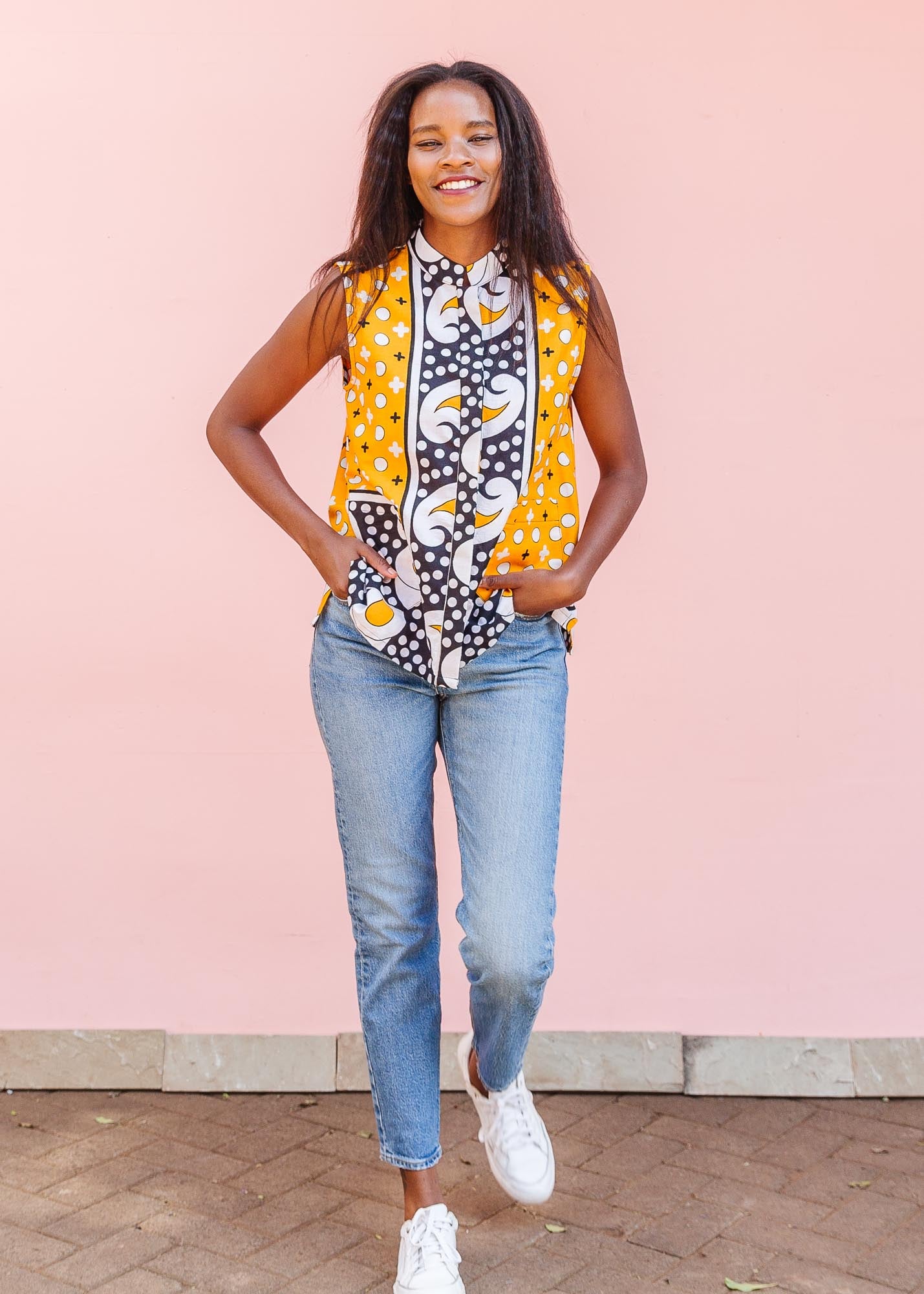 The model is wearing two toned pattern block print tank