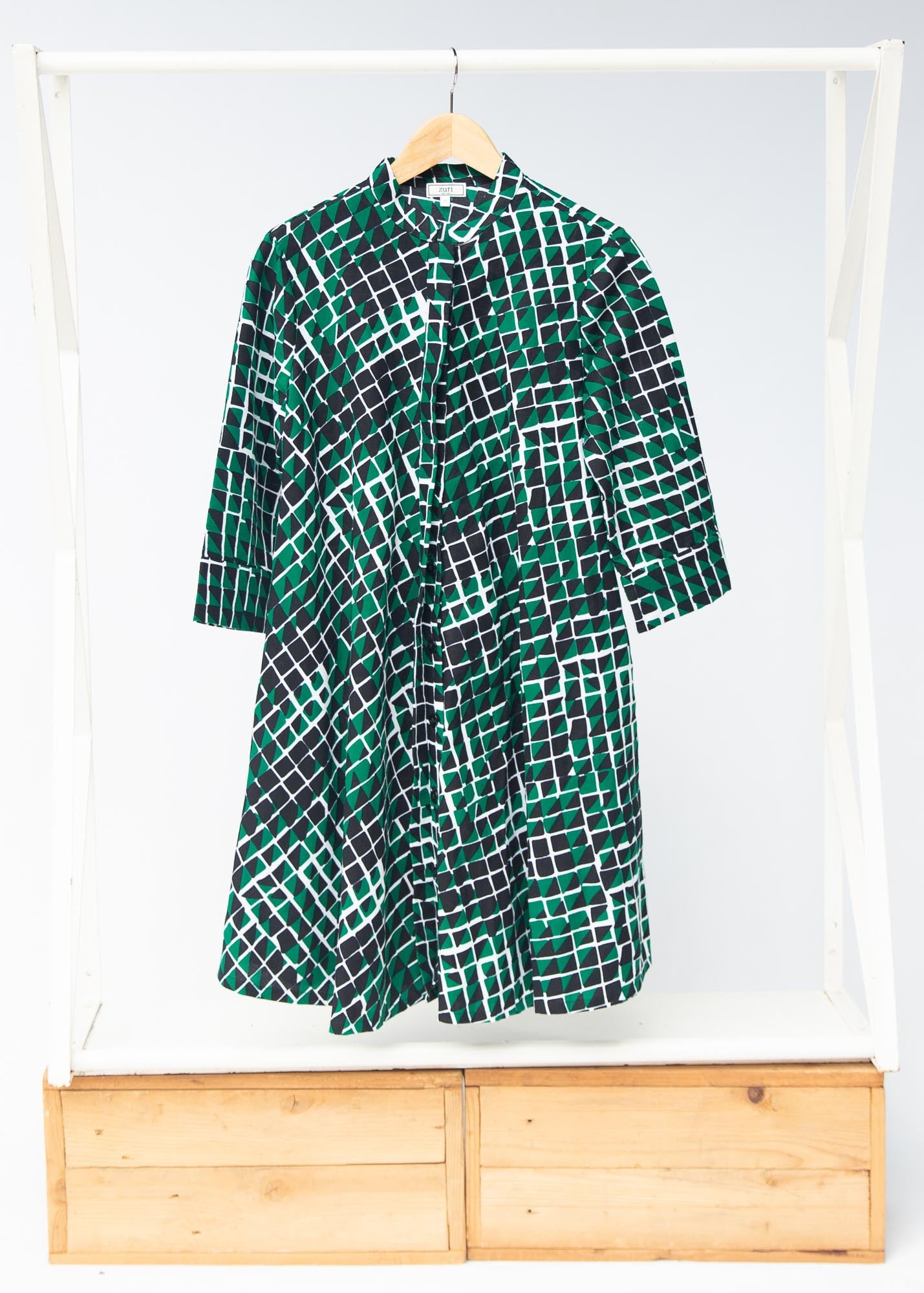 green and white geometric print dress Pariaura Blue & White Geometric Print Sleeveless Round Neck Dress, Waist Cinched Design With Ruffle Hem, Casual Vacation Style