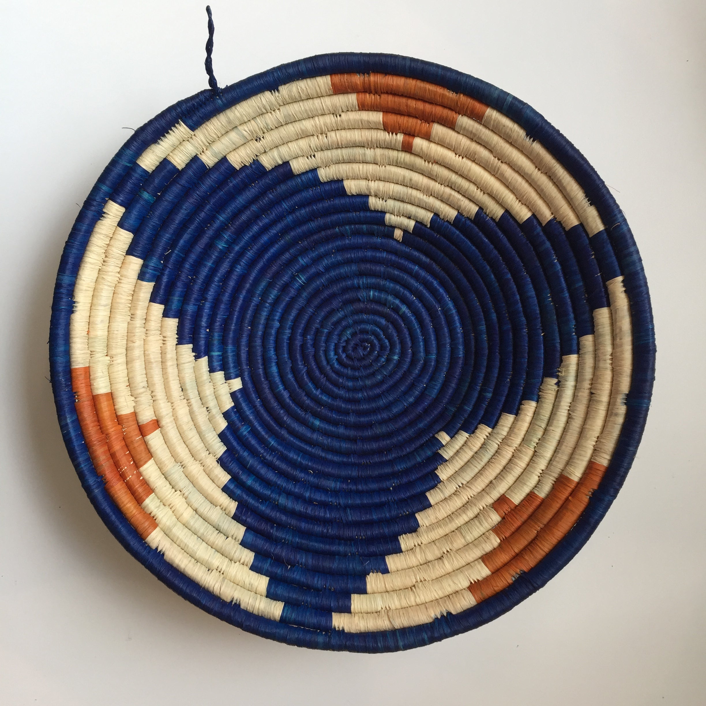 Blue and orange flower design woven bowl