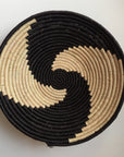 Black and natural pinwheel design woven bowl