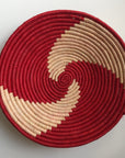 Red and natural pinwheel design woven bowl