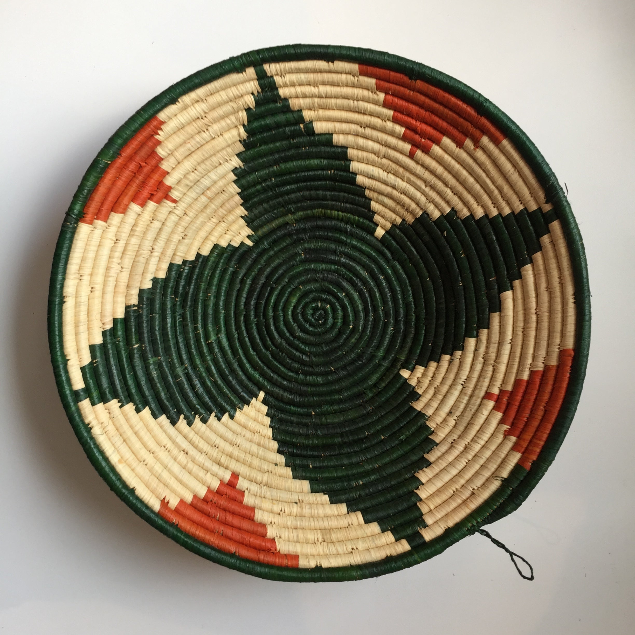Green and orange flower design woven bowl
