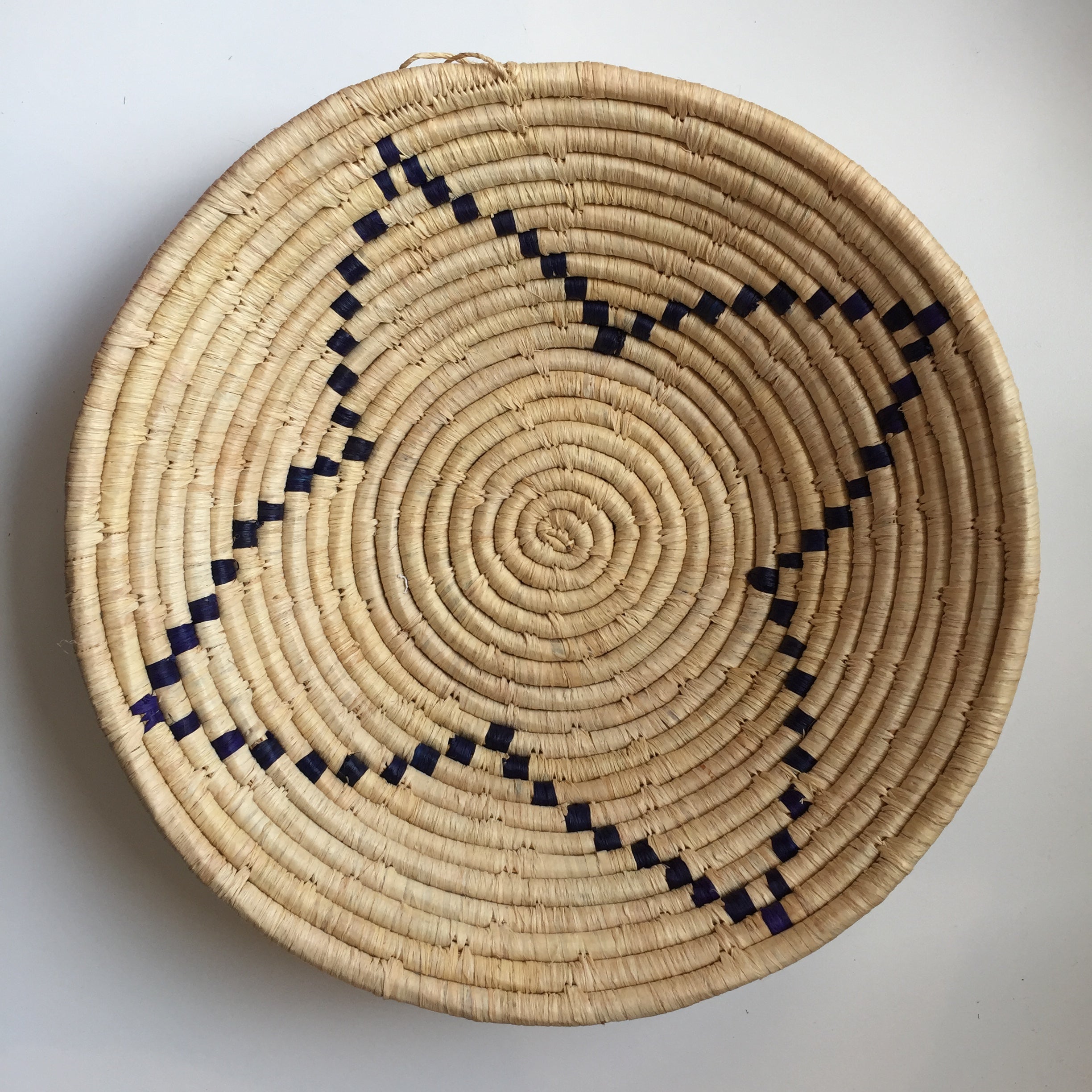 Natural and black flower design woven bowl