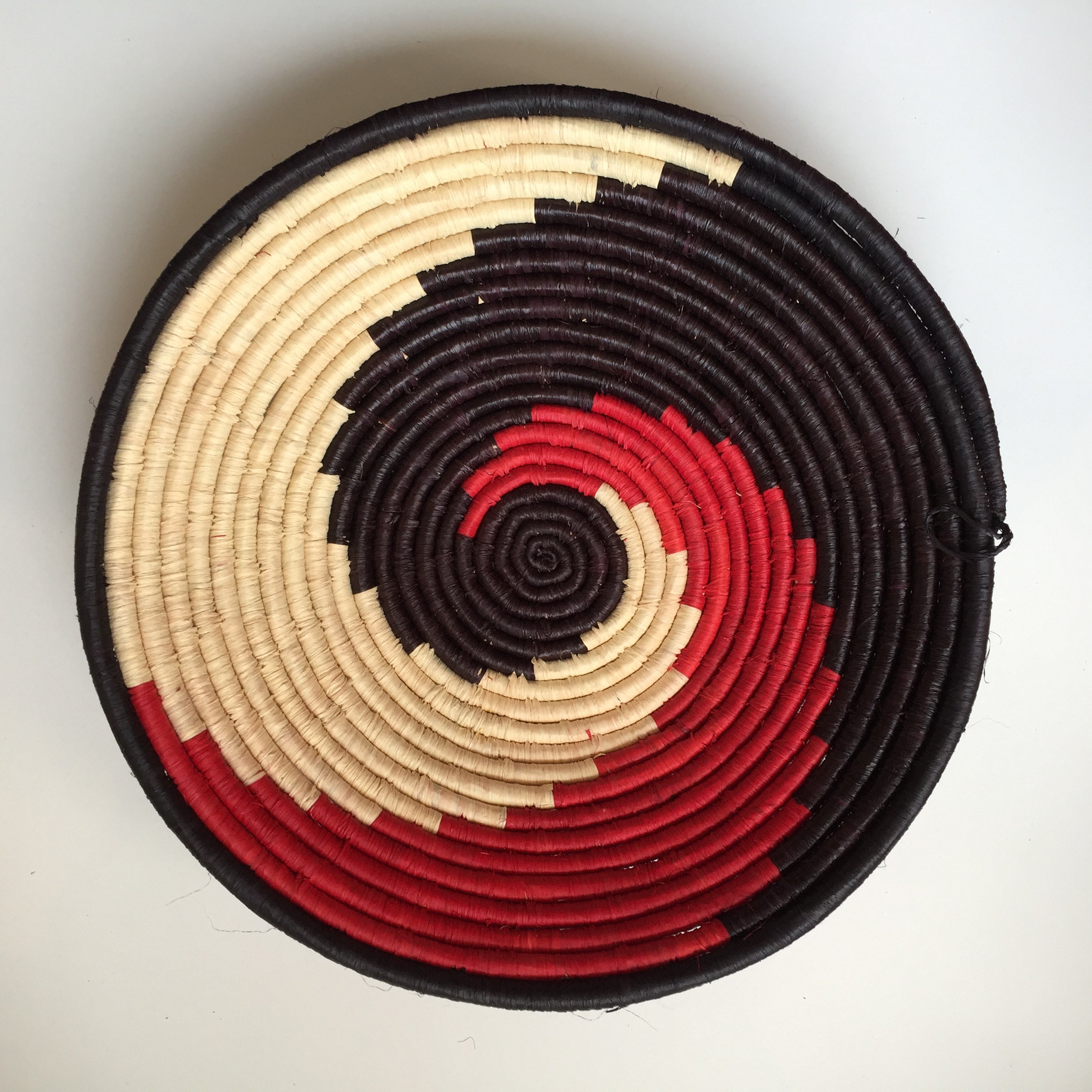 Red and black swirl woven bowl