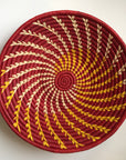Red and yellow swirl woven bowl