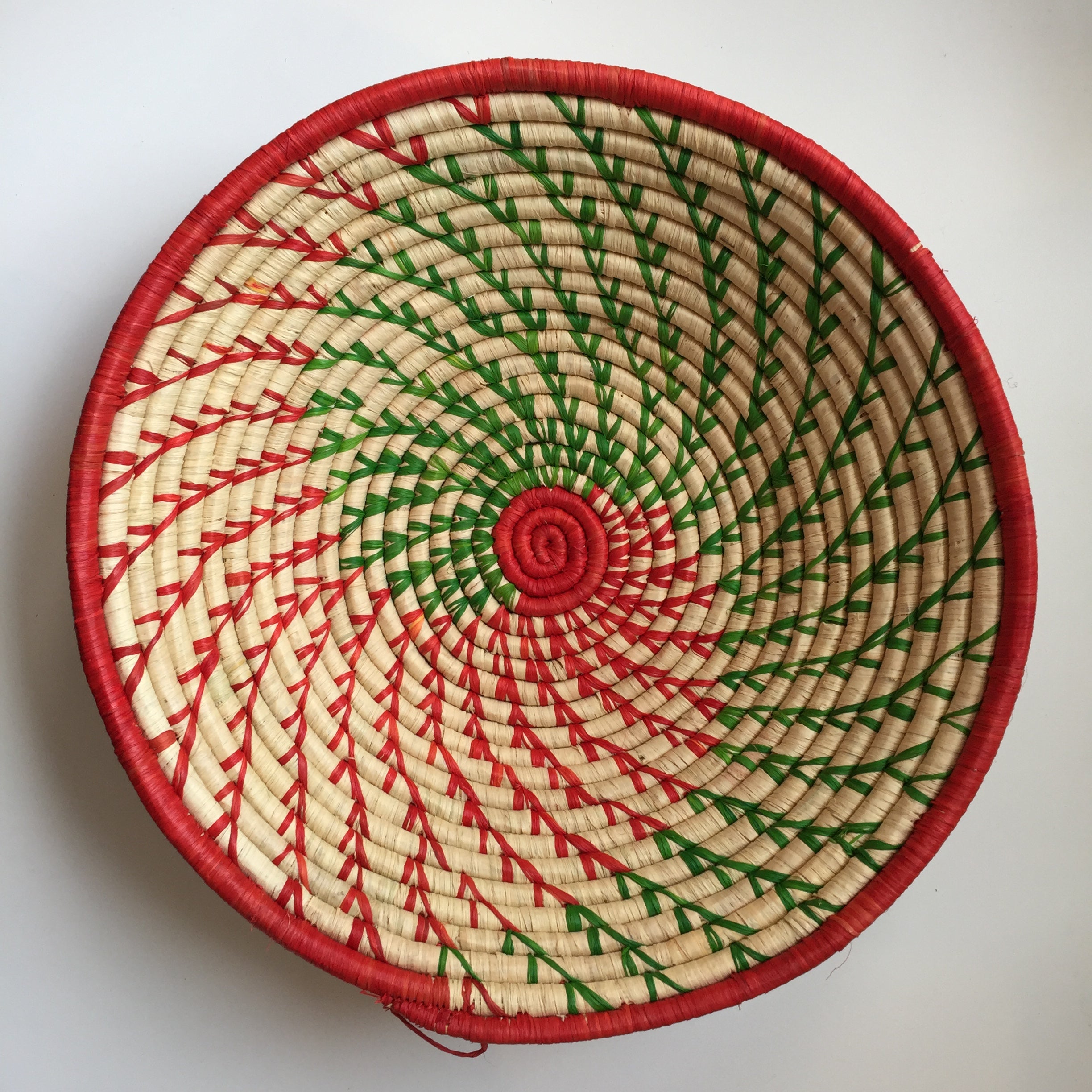 Red and green swirl woven bowl