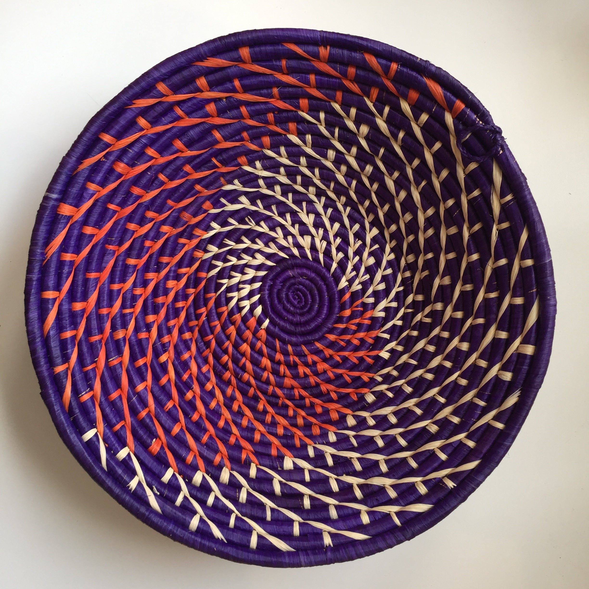 Purple and orange swirl woven bowls