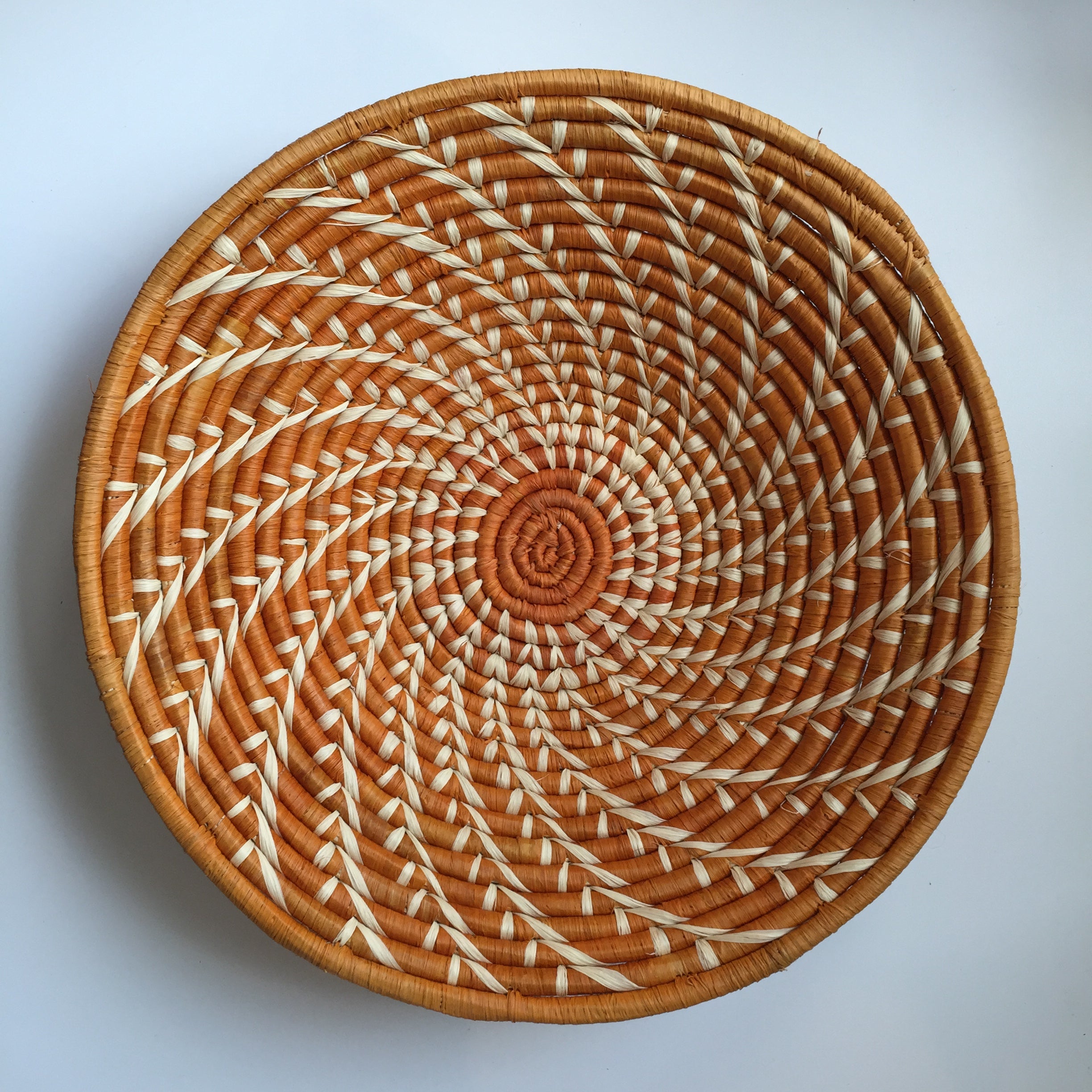 Orange and natural swirl bowl