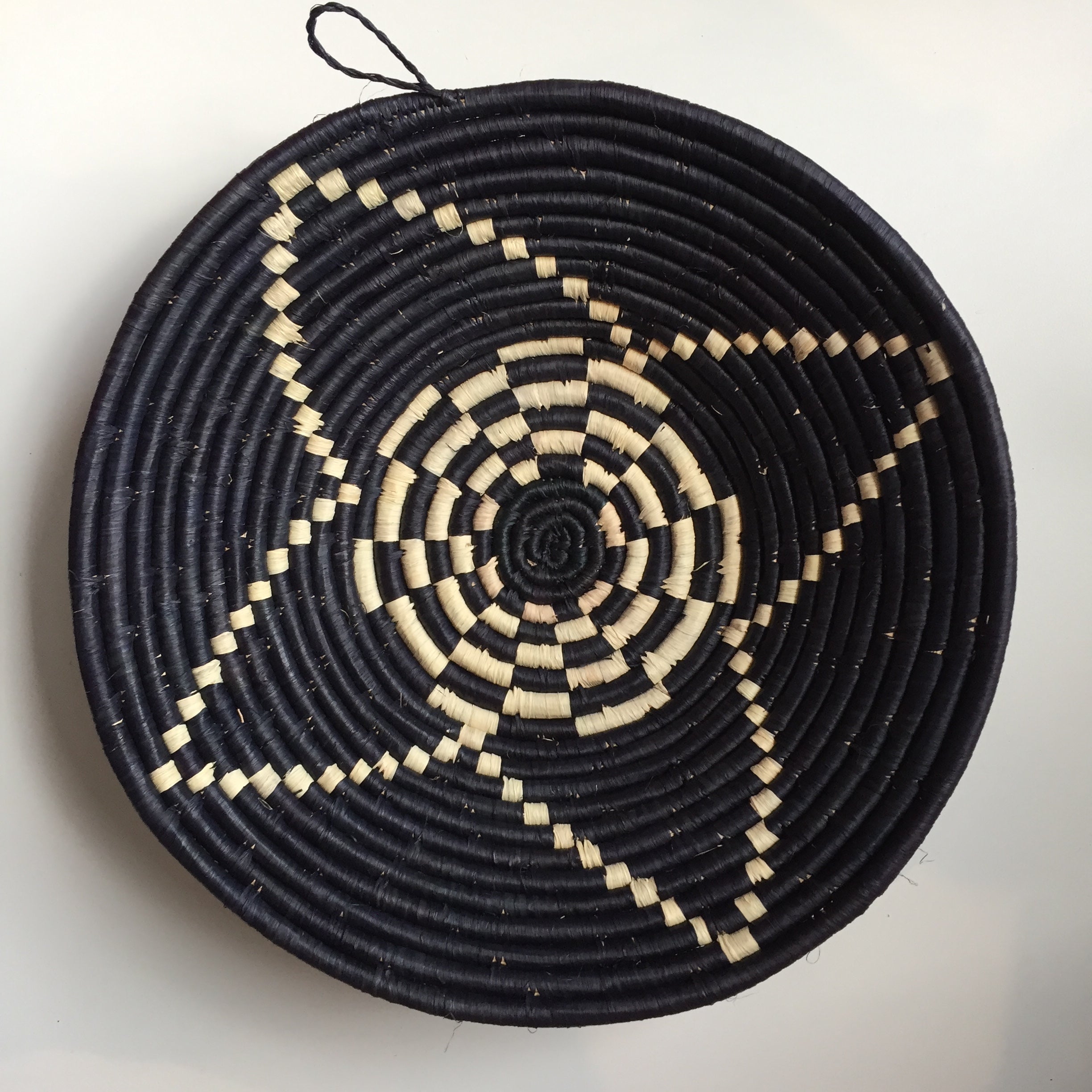 Black and natural flower design woven bowl