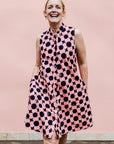 Pink dress with black and white dots
