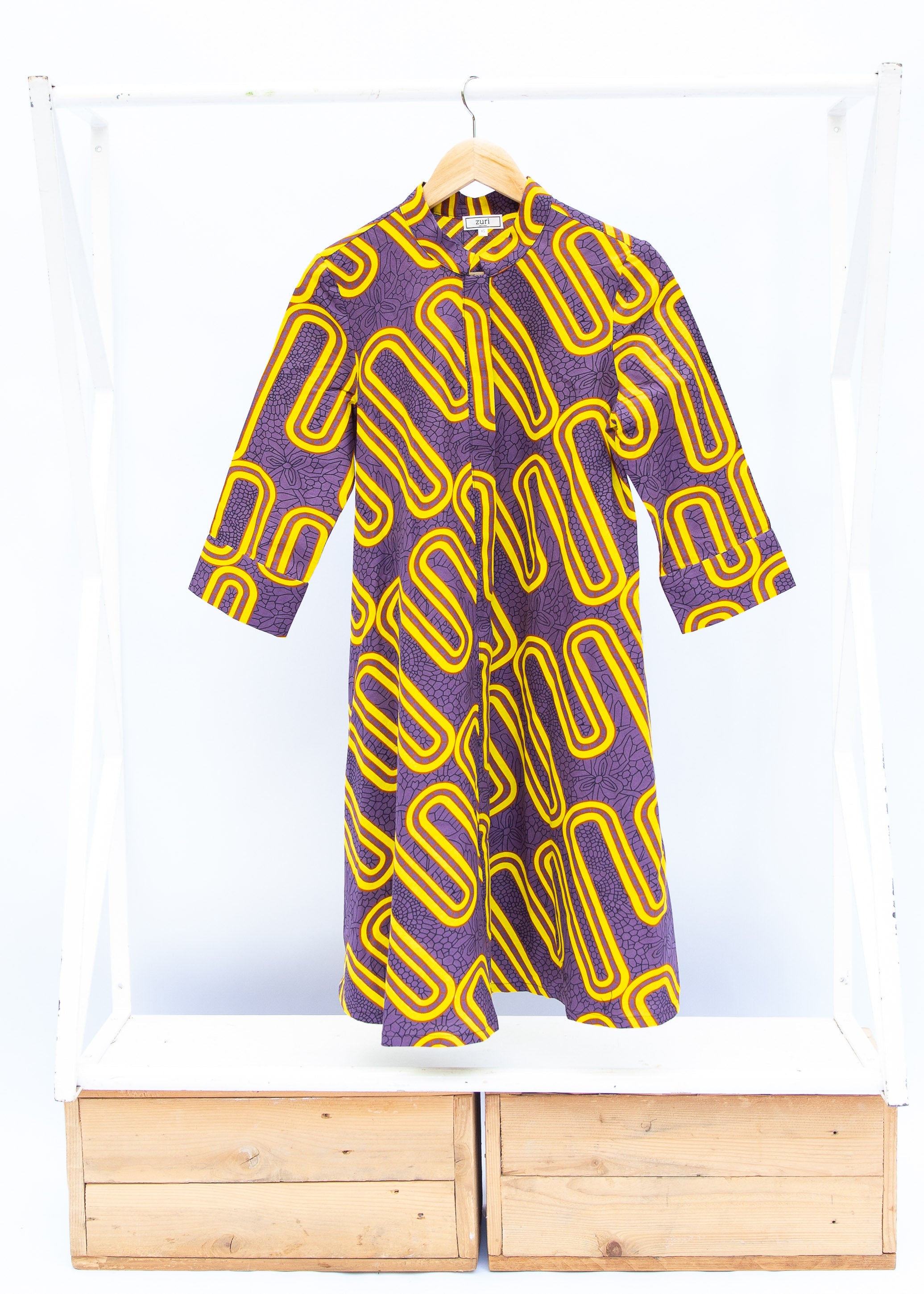 Purple dress with yellow squiggles