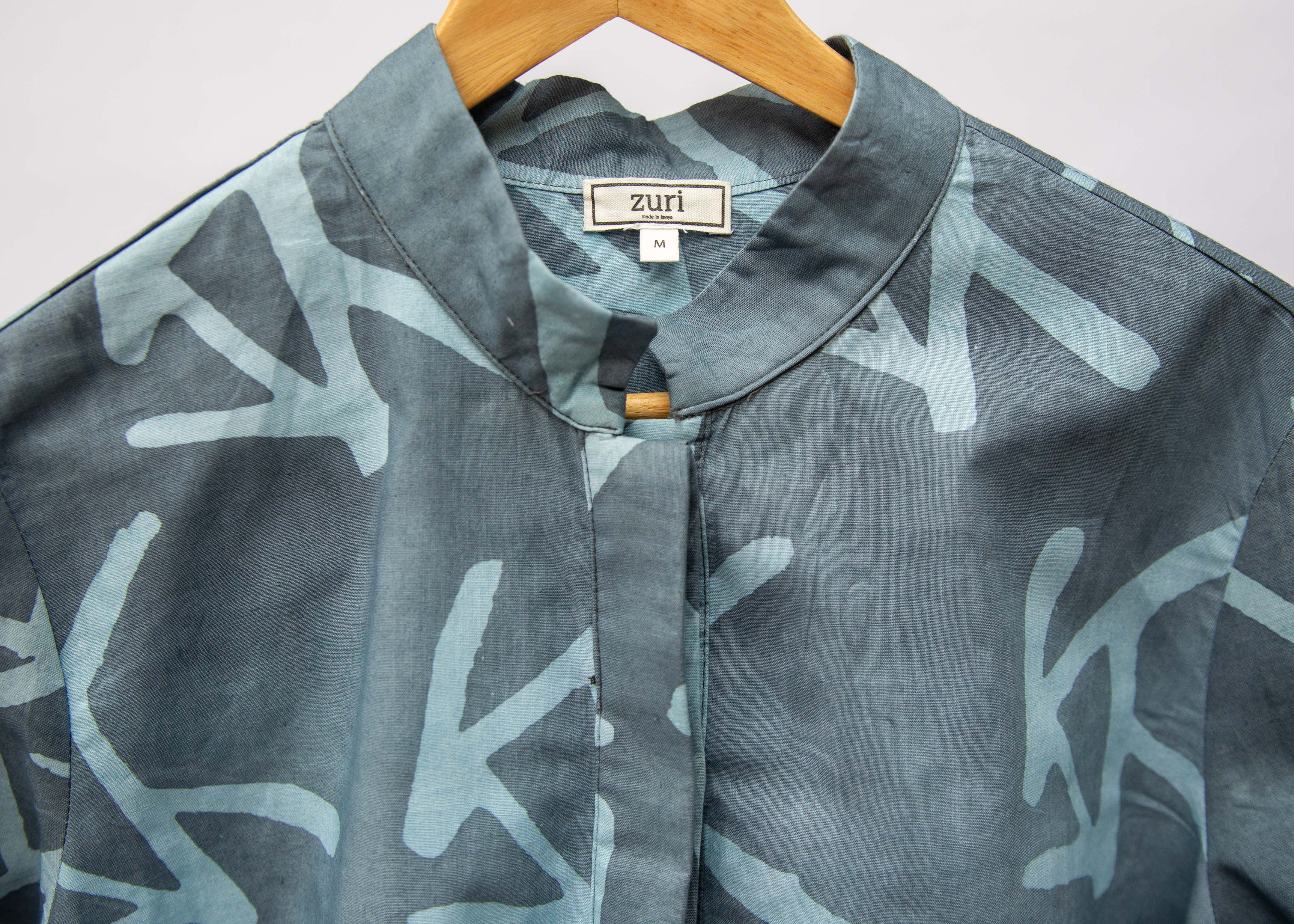 Gray shirt with abstract line design